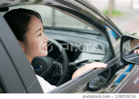 Young woman in a car 126059216