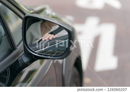 Young woman in a car 126060207