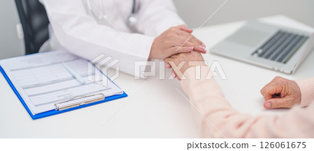 doctor holding hands with elderly female patient, showing empathy and support during a medical consultation. trust, Senior and geriatric care, healthcare, Mental Health, giving advice and emotional doctor holding hands with elderly female patient, showing empathy and support during a medical consultation. trust, Senior and geriatric care, healthcare, Mental Health, giving advice and emotional 126061675
