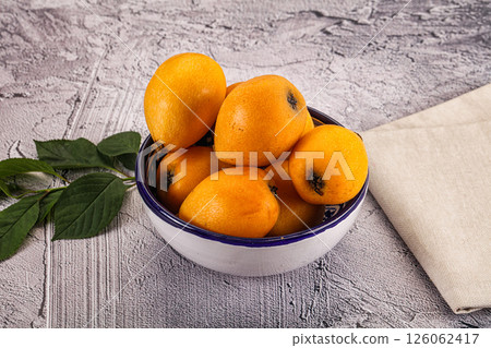 Ripe sweet juicy medlar fruit 126062417