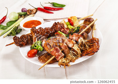 Asian grilled skewer assortment satay 126062455