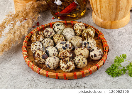 Raw quail egg in the bowl Raw quail egg in the bowl 126062506