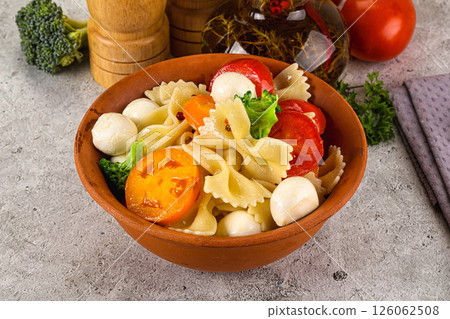 Pasta farfalle with mozzarella and tomato Pasta farfalle with mozzarella and tomato 126062508