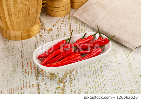 Red hot chili pepper heap Red hot chili pepper heap 126062620