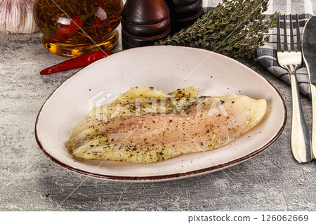 Baked tilapia fish with spices Baked tilapia fish with spices 126062669