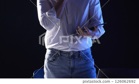 People working together and sharing ideas in a modern business environment. 126062692