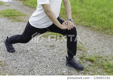 Young man stretching in the park 126063192
