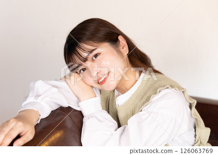 Woman relaxing on the sofa Woman relaxing on the sofa 126063769