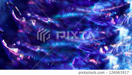 Defocused neon gleam. Glow flare. Sparkling lens light purple blue blurred waves art bokeh abstract background. Defocused neon gleam. Glow flare. Sparkling lens light purple blue blurred waves art bokeh abstract background. 126063917