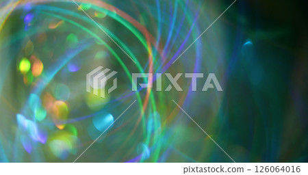 Blur glow. Defocused shiny flare. Gleaming green yellow multicolored circles lens on bokeh light abstract background. Blur glow. Defocused shiny flare. Gleaming green yellow multicolored circles lens on bokeh light abstract background. 126064016