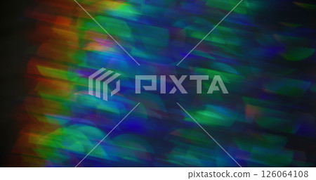 Lens flare. Defocused glow. Colorful blue orange gleaming kaleidoscope bokeh light blurred modern background. 126064108