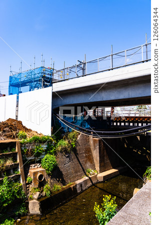 Railway viaduct construction across a stream Around Higashimurayama Station, Tokyo 2025.04 c-2 High saturation contrast 126064344