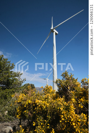 Wind turbine with blue sky at background 126066131