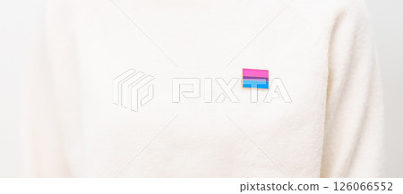 Bisexuality Celebrate Day and LGBT pride month, LGBTQ or LGBTQIA concept. Hand holding purple, pink and blue flag shape for Lesbian, Gay, Bisexual, Transgender, Queer, Pansexual, Marriage Equality Law 126066552