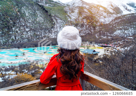 Tourist standing at Huanglong national park in winter, Sichuan in China. 126066685