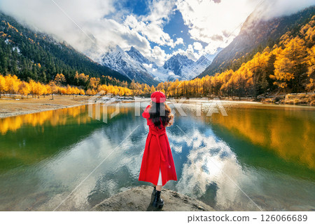Tourist taking photo of Bipenggou in autumn, Chengdu in China. 126066689
