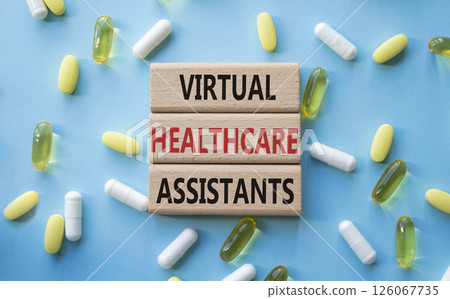 Medicine symbol. Concept words Virtual Healthcare Assistants on wooden blocks. Beautiful blue background with pills. Medicine concept and Virtual Healthcare Assistants. Copy space 126067735