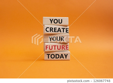 Future and development symbol. Wooden blocks with words You Create your Future today. Beautiful orange background. Business and Future and development concept. Copy space. 126067748