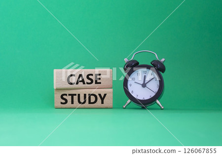 Case Study symbol. Wooden blocks with words Case Study. Beautiful green background with alarm clock. Business and Case Study concept. Copy space. 126067855
