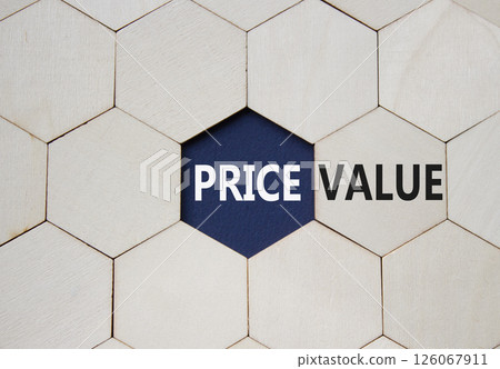 Price and Value symbol. Concept word Price and Value on wooden comb puzzle. Beautiful deep blue background. Business and Price and Value concept. Copy space 126067911