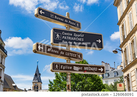 Traffic Signs to streets and places in Paris. Post Office, sports center, others 126068091