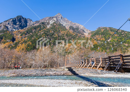 Late autumn at Kamikochi, one of Japan's leading mountain resorts: Mount Myojin and Myojin Bridge 126068340