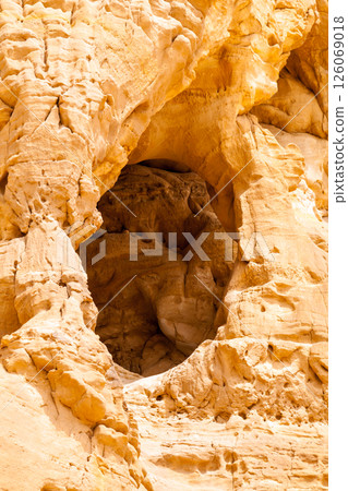 Hole in a rock. Timna park, Israel 126069018
