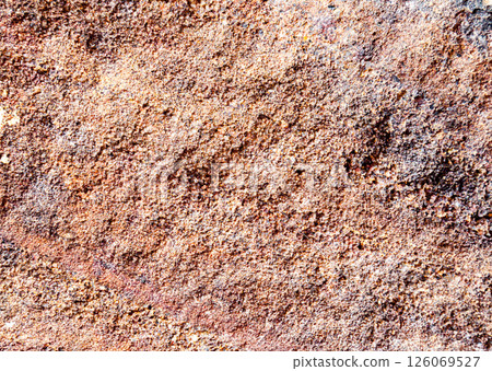 Red rock with porous texture, top view Red rock with porous texture, top view 126069527