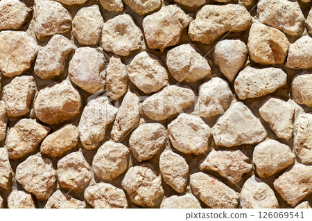 Wall made of cobblestones, close up 126069541
