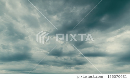 A Dramatic Overcast Sky Exhibiting Intricate Cloud Patterns and Unique Atmospheric Qualities A Dramatic Overcast Sky Exhibiting Intricate Cloud Patterns and Unique Atmospheric Qualities 126070681