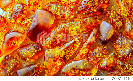 Mesmerizing and Sparkling CloseUp Photography of Exquisite and Beautiful Amber Resin 126071146