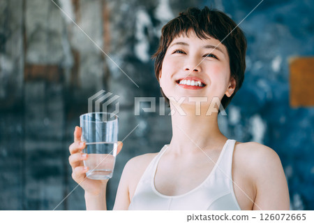 Young woman drinking water Hydration 126072665