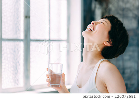 Young woman drinking water Hydration Young woman drinking water Hydration 126072681