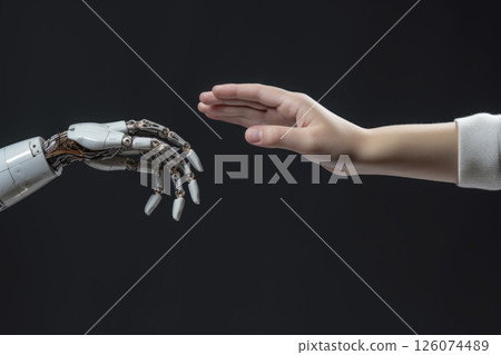 Human hand reaching out to robotic hand, symbolizing connection between technology and humanity Human hand reaching out to robotic hand, symbolizing connection between technology and humanity 126074489