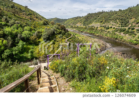 Walking along the Barca da Amieira walkways in Amieira do Tejo, Portugal. 126074609