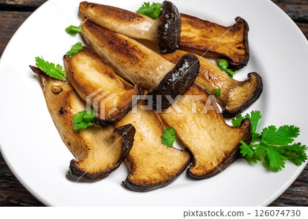 King Oyster Mushroom Steak, Eryngii mushrooms King Oyster Mushroom Steak, Eryngii mushrooms 126074730