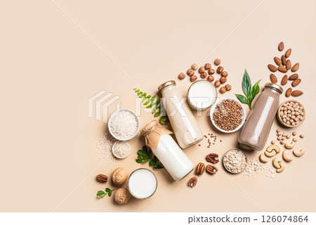 Various vegan plant based milk bottles and ingredients, lactose free drink Various vegan plant based milk bottles and ingredients, lactose free drink 126074864