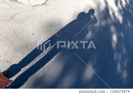 My shadow holding the camera 126074874