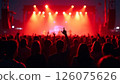 crowd enjoying a live concert with vibrant stage lights in music venue 126075626