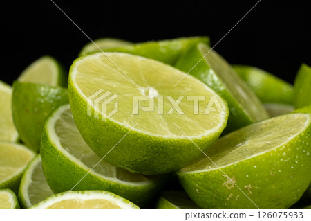 Close-Up of Green Citrus Lime Halves with Juicy Detail 126075933