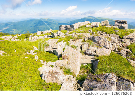 carpathian mountain range landscape in summer. gorgeous alpine scenery with huge white sharp stones among the grassy meadow near hillside in morning light. stunning view in to the distant open vista 126076208