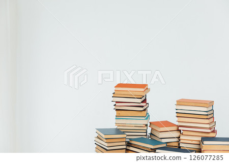 Stacks of educational books for learning on a white background Stacks of educational books for learning on a white background 126077285