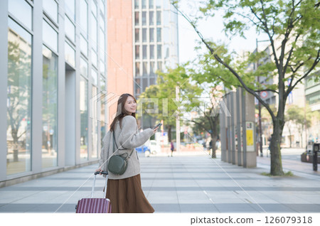 Woman traveling 126079318