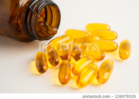 Fish oil or Cod liver oil gel in capsules with omega 3 vitamins, supplementary healthy food. 126079326
