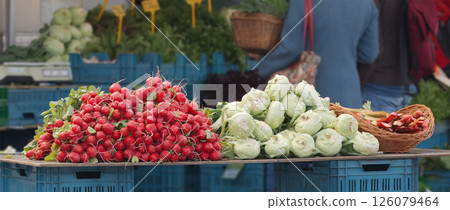 Fresh Vegetables and Radishes Displayed at Local Farmers Market Stall Outdoors Fresh Vegetables and Radishes Displayed at Local Farmers Market Stall Outdoors 126079464