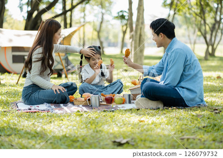 Happy asian family picnic in park, weekend lifestyle outdoors. 126079732