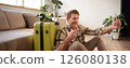 Portrait of smiling handsome man with suitcase, taking selfie with luggage, posting on social media about going on holiday 126080138