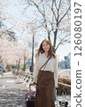 Woman traveling during cherry blossom season 126080197