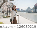 Woman traveling during cherry blossom season 126080219