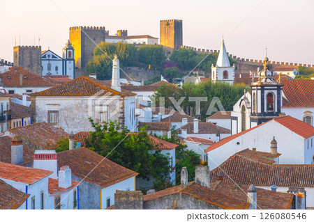 Obidos, Portugal: A picturesque view of the medieval town and castle at sunset 126080546